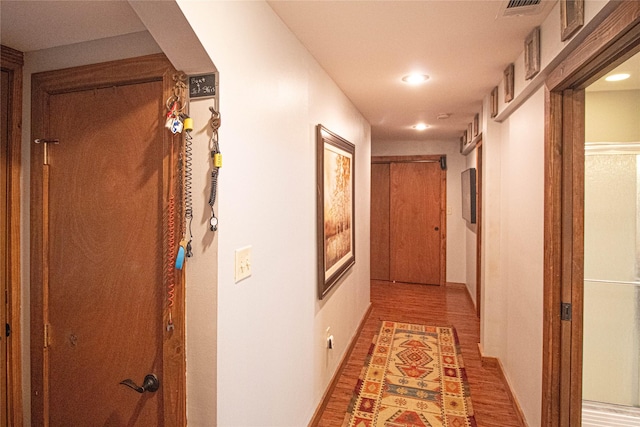 70 Lower Cove Dr, Point Blank, TX 77364 - hallway featuring light wood-style flooring and recessed lighting