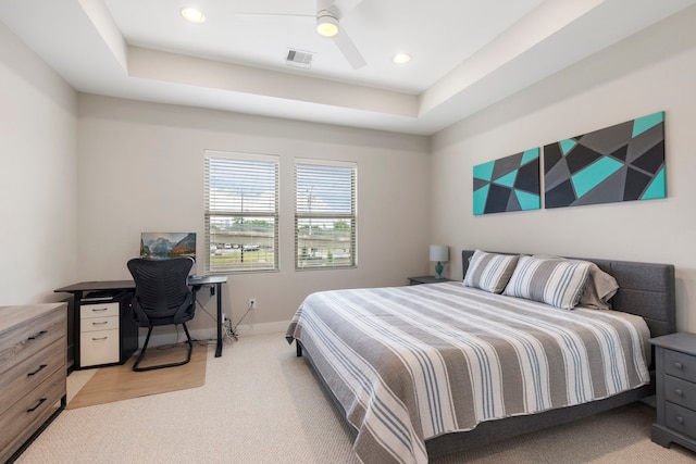 bedroom with light colored carpet, visible vents, baseboards, recessed lighting, and a ceiling fan