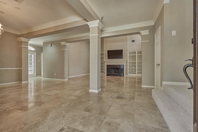 unfurnished living room with crown molding, a tiled fireplace, decorative columns, and baseboards