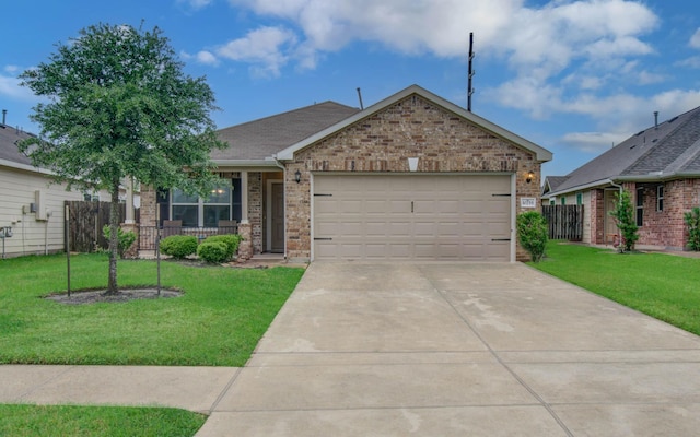 10255 Scenic Vista Dr, Humble, TX 77396 - ranch-style home featuring concrete driveway, an attached garage, fence, a front lawn, and brick siding