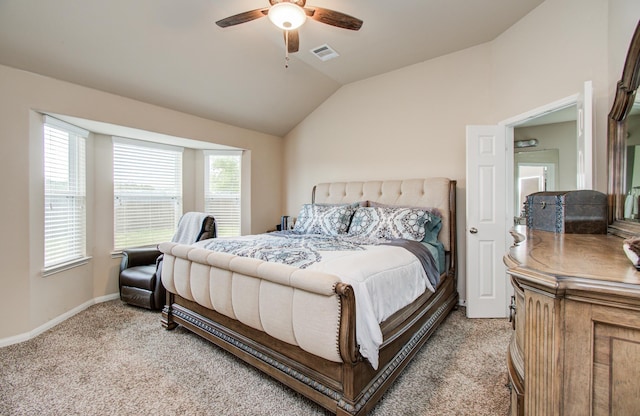 10255 Scenic Vista Dr, Humble, TX 77396 - bedroom with light colored carpet, visible vents, ceiling fan, baseboards, and vaulted ceiling