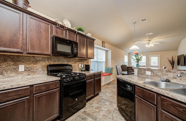 10255 Scenic Vista Dr, Humble, TX 77396 - kitchen with visible vents, black appliances, light countertops, and a sink