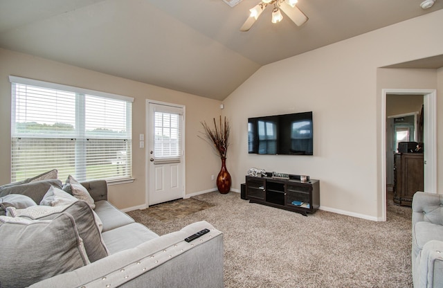 10255 Scenic Vista Dr, Humble, TX 77396 - carpeted living room featuring a ceiling fan, lofted ceiling, and baseboards