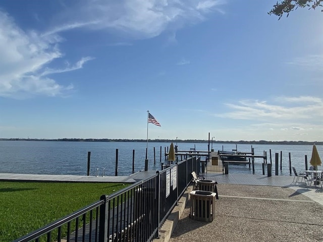 dock area with a water view