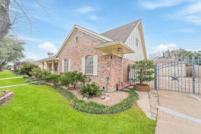 7718 Pella Dr, Houston, TX 77036 - view of home's exterior with a yard, a gate, brick siding, fence, and a shingled roof