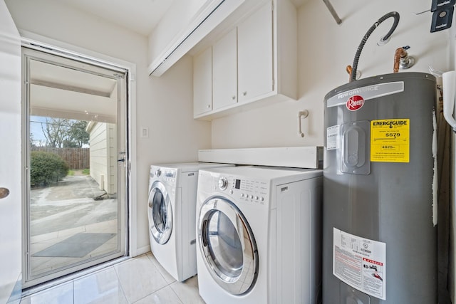 7718 Pella Dr, Houston, TX 77036 - clothes washing area with water heater, separate washer and dryer, and cabinet space