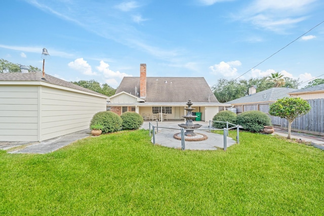 7718 Pella Dr, Houston, TX 77036 - back of property featuring a chimney, fence, and a yard