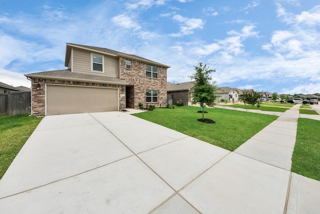 traditional-style home featuring a front lawn, roof with shingles, concrete driveway, an attached garage, and fence