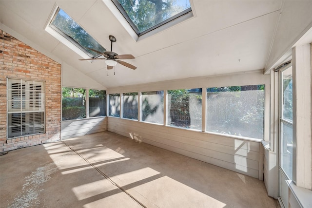 unfurnished sunroom with a skylight and a ceiling fan