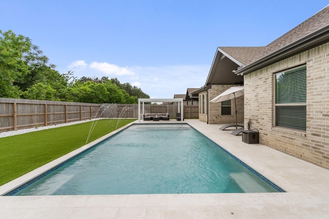 view of pool featuring outdoor lounge area, a patio, a fenced backyard, a fenced in pool, and a lawn