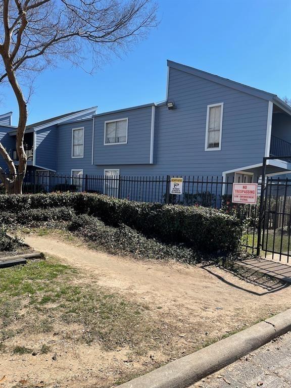 exterior space with fence