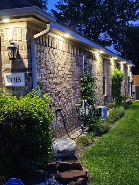 1318 Evermore Manor Ln, Houston, TX 77073 - view of side of property featuring brick siding, a yard, and cooling unit