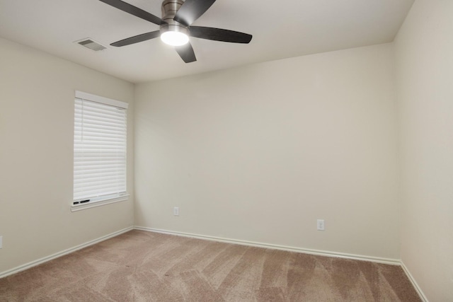 1318 Evermore Manor Ln, Houston, TX 77073 - spare room featuring light colored carpet, a ceiling fan, and baseboards