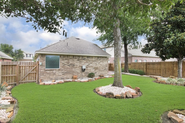 1318 Evermore Manor Ln, Houston, TX 77073 - rear view of property with a shingled roof and brick siding