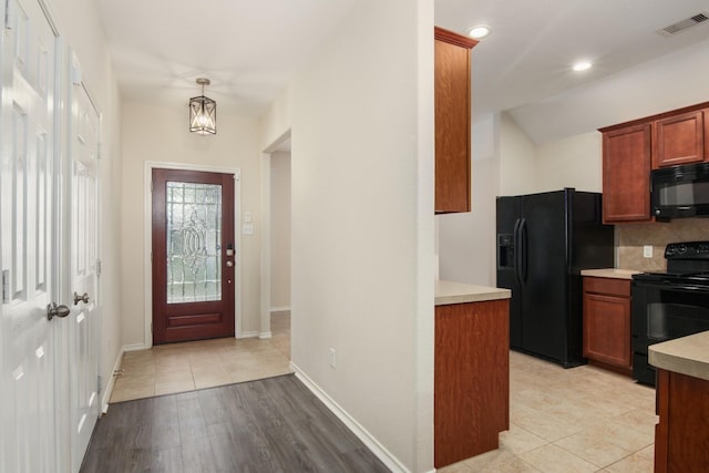 1318 Evermore Manor Ln, Houston, TX 77073 - foyer with recessed lighting, baseboards, and light wood-style flooring