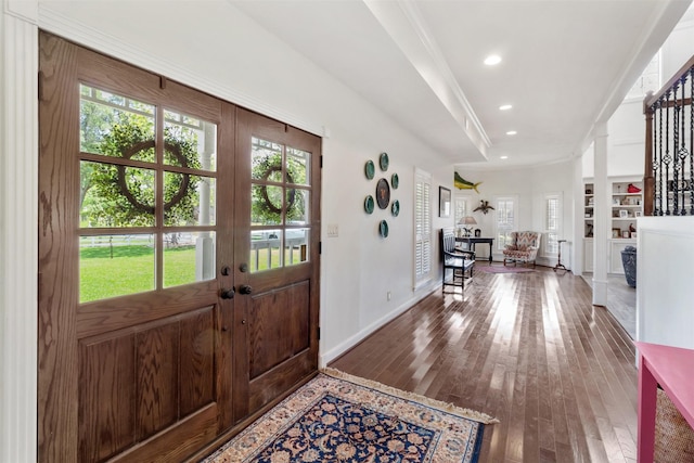 2215 Pecan Lake Dr, Richmond, TX 77406 - entrance foyer with healthy amount of natural light, hardwood / wood-style floors, baseboards, recessed lighting, and french doors