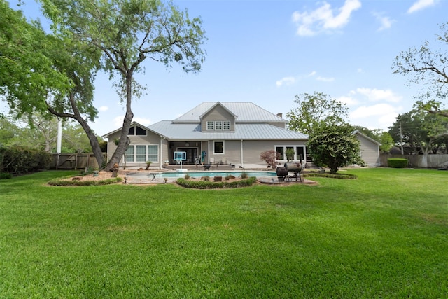 2215 Pecan Lake Dr, Richmond, TX 77406 - back of house with a patio area and metal roof
