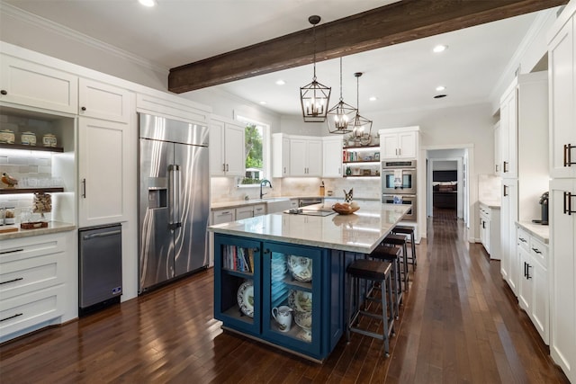 2215 Pecan Lake Dr, Richmond, TX 77406 - kitchen featuring open shelves, stainless steel appliances, a center island, a kitchen bar, and white cabinetry