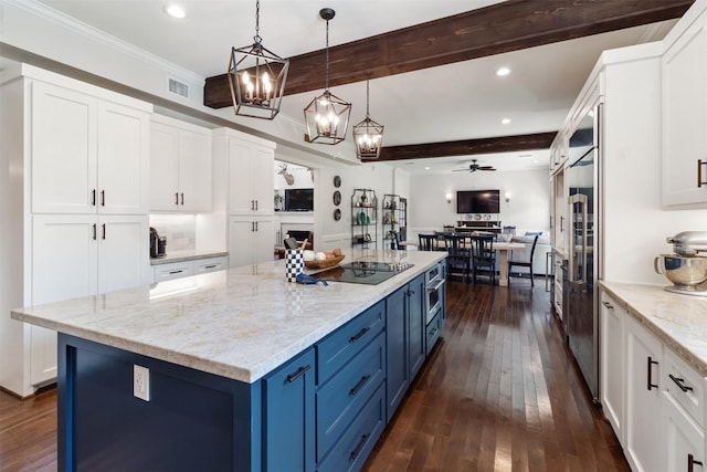 2215 Pecan Lake Dr, Richmond, TX 77406 - kitchen featuring blue cabinets, black electric cooktop, open floor plan, beam ceiling, and dark wood-type flooring