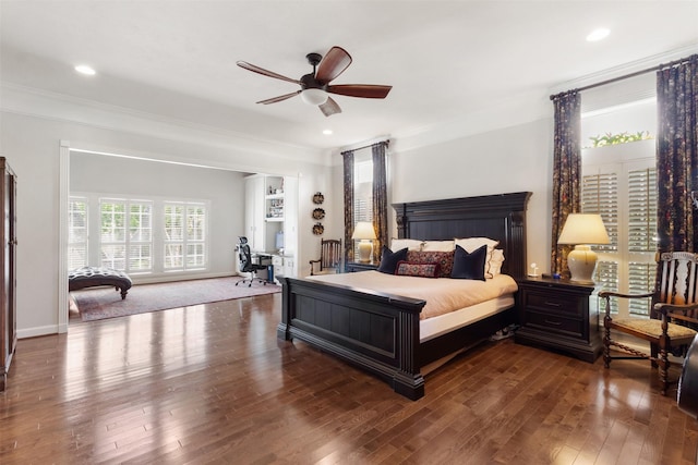 2215 Pecan Lake Dr, Richmond, TX 77406 - bedroom with crown molding, dark wood-style floors, and ceiling fan