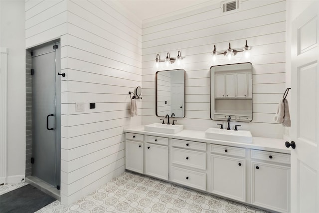 2215 Pecan Lake Dr, Richmond, TX 77406 - bathroom with wood walls, double vanity, and a shower stall