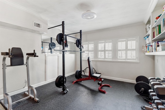 2215 Pecan Lake Dr, Richmond, TX 77406 - workout room featuring crown molding and baseboards