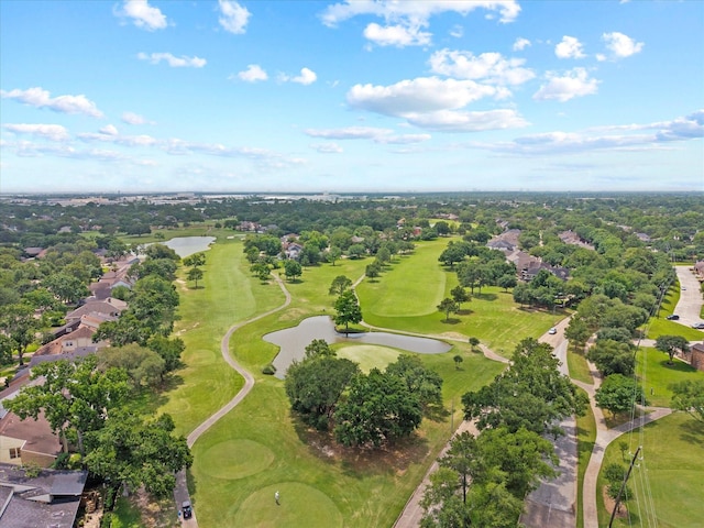 bird's eye view with a water view, view of golf course, and a residential view