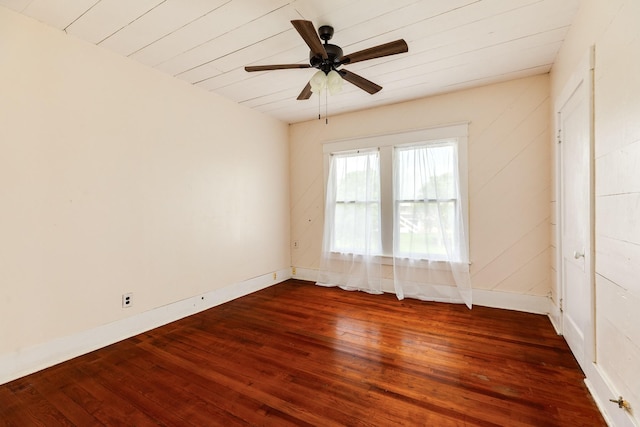 unfurnished bedroom with dark wood-style floors, ceiling fan, and baseboards