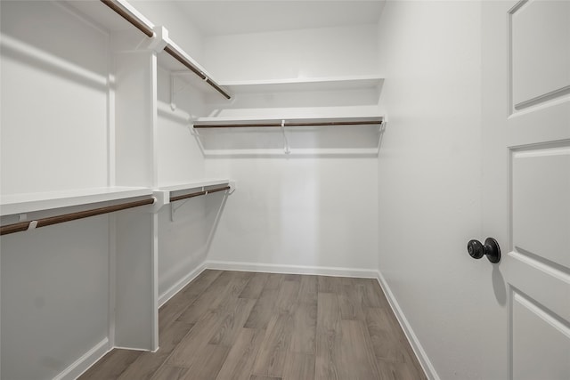 212 W Alabama St, Wharton, TX 77488 - spacious closet with wood finished floors