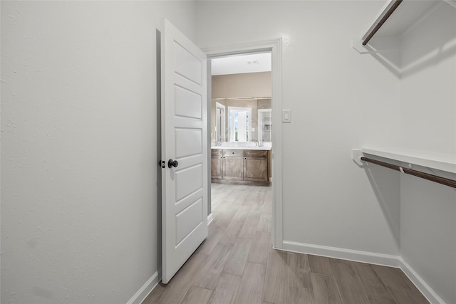 212 W Alabama St, Wharton, TX 77488 - walk in closet featuring light wood finished floors