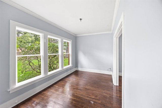 212 W Alabama St, Wharton, TX 77488 - unfurnished room featuring ornamental molding and dark wood-style floors
