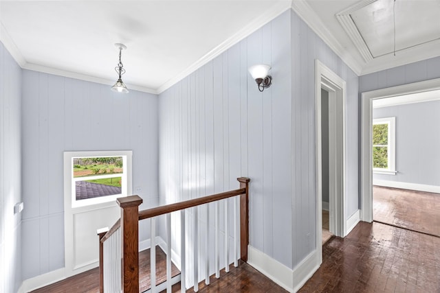 212 W Alabama St, Wharton, TX 77488 - hall featuring attic access, an upstairs landing, ornamental molding, and dark wood-style flooring