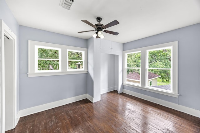 212 W Alabama St, Wharton, TX 77488 - unfurnished bedroom with hardwood / wood-style floors and a ceiling fan