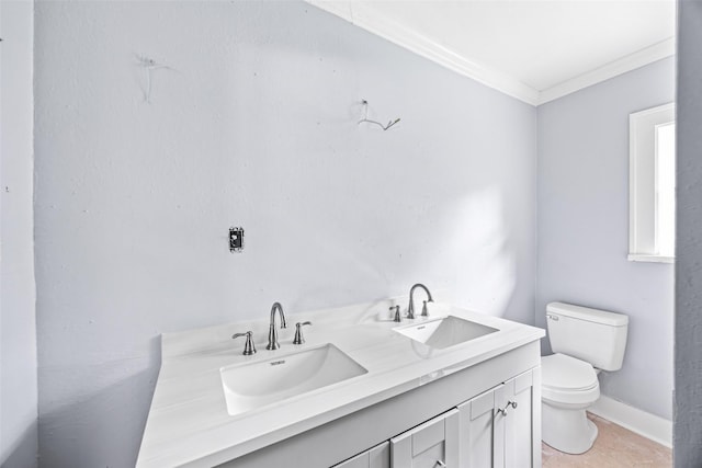 212 W Alabama St, Wharton, TX 77488 - bathroom featuring ornamental molding, double vanity, and tile patterned flooring