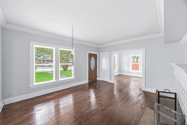 212 W Alabama St, Wharton, TX 77488 - entryway with hardwood / wood-style flooring and crown molding