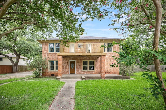 212 W Alabama St, Wharton, TX 77488 - view of front of property featuring a balcony and brick siding