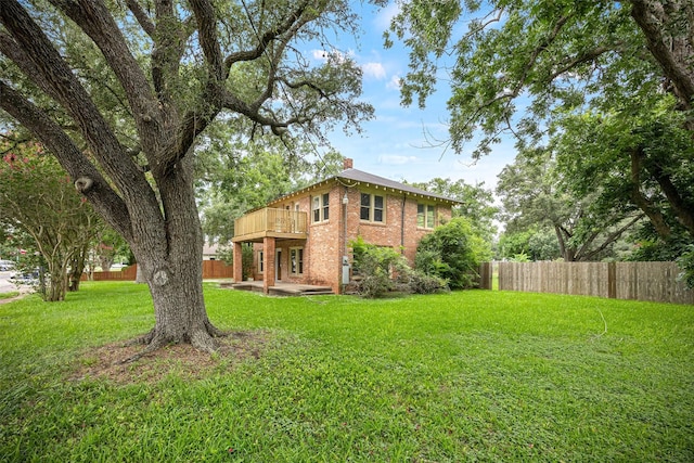 212 W Alabama St, Wharton, TX 77488 - view of yard with a deck and a patio