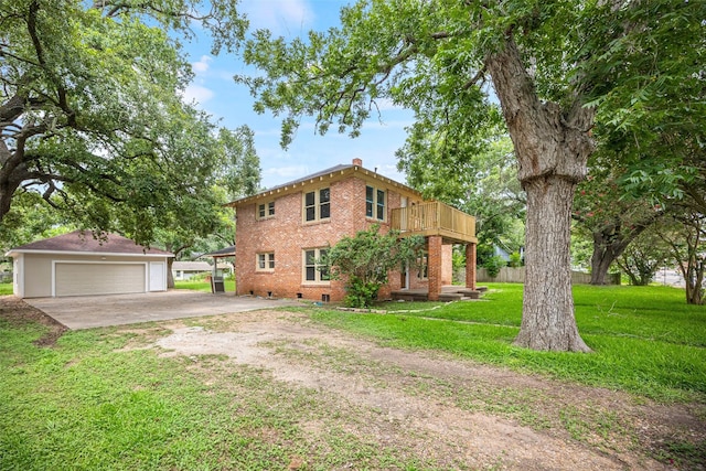 212 W Alabama St, Wharton, TX 77488 - view of property exterior featuring an outbuilding, a garage, brick siding, a yard, and a chimney
