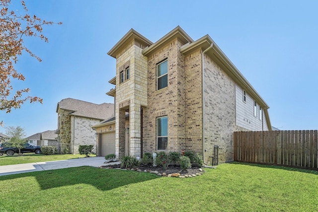 view of side of home with a lawn, driveway, brick siding, an attached garage, and fence