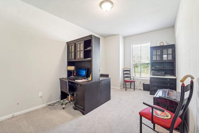 office with baseboards and carpet flooring