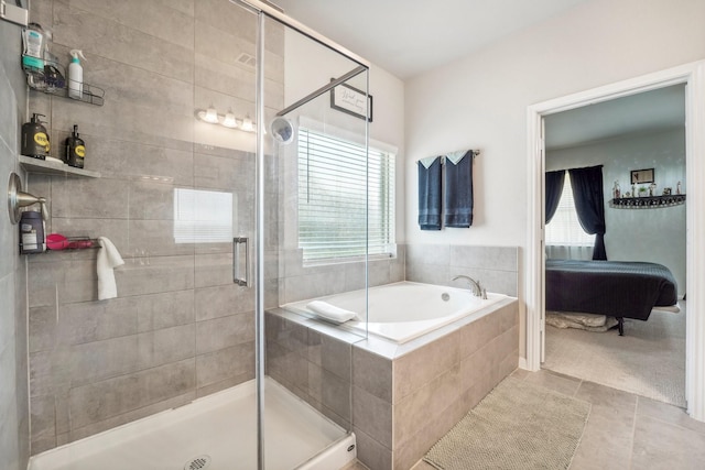 full bathroom with tile patterned floors, a stall shower, and a bath