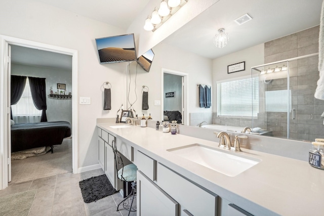 ensuite bathroom featuring ensuite bath, a sink, visible vents, and a stall shower