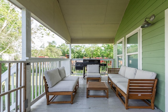 deck featuring outdoor lounge area