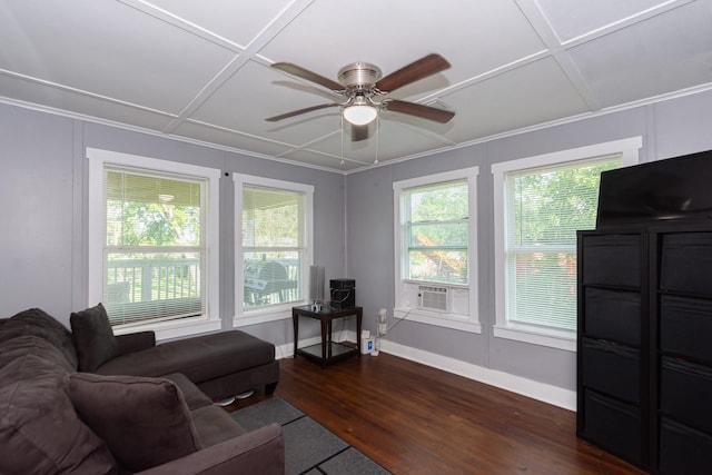 living area featuring coffered ceiling, ceiling fan, wood finished floors, and baseboards