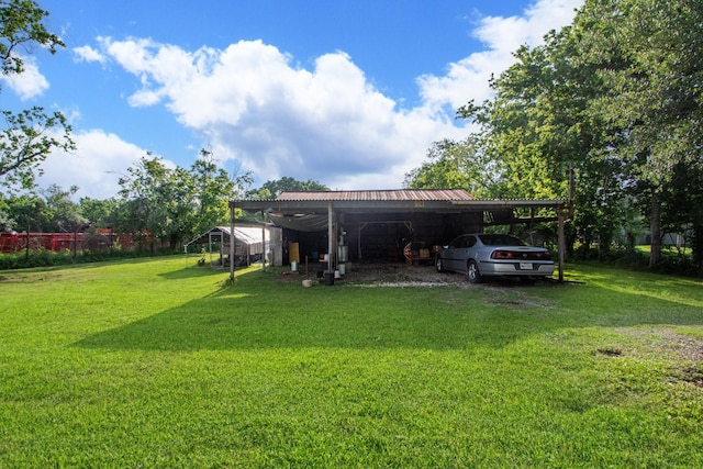 view of yard with a carport
