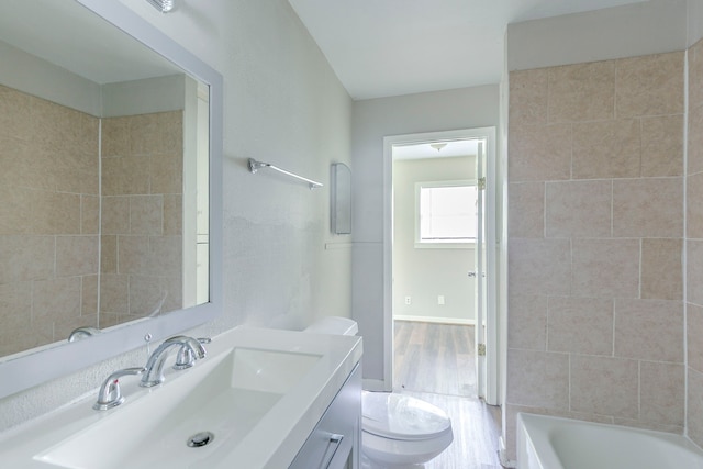 full bath with toilet, bathing tub / shower combination, and vanity