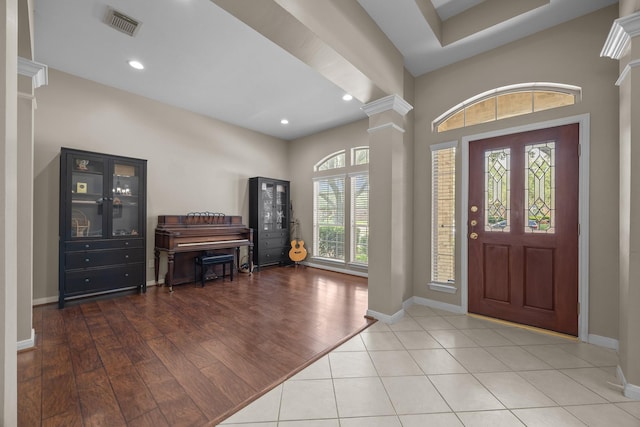 16511 Crystal View Ct, Houston, TX 77095 - foyer entrance with ornate columns, recessed lighting, baseboards, and visible vents