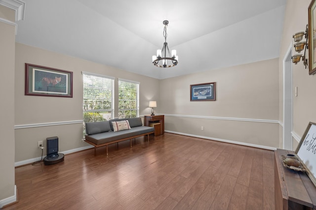 16511 Crystal View Ct, Houston, TX 77095 - sitting room with baseboards, a notable chandelier, and wood finished floors