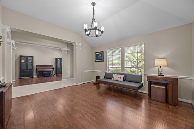 16511 Crystal View Ct, Houston, TX 77095 - living area featuring an inviting chandelier, wood-type flooring, ornate columns, and lofted ceiling