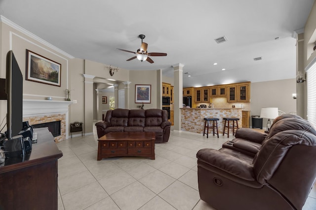 16511 Crystal View Ct, Houston, TX 77095 - living area featuring light tile patterned floors, ceiling fan, decorative columns, and visible vents